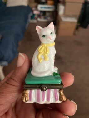 White Ceramic Cat Figurine with Yellow Bow on Green Base - Unbranded